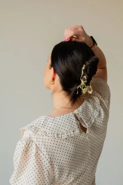 Andi Gold Bow Squiggle Claw Clip