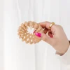 Andi Light Brown Bird Nest Expng Hair Claw
