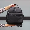 Andi the 1 MINI in Pebble Black